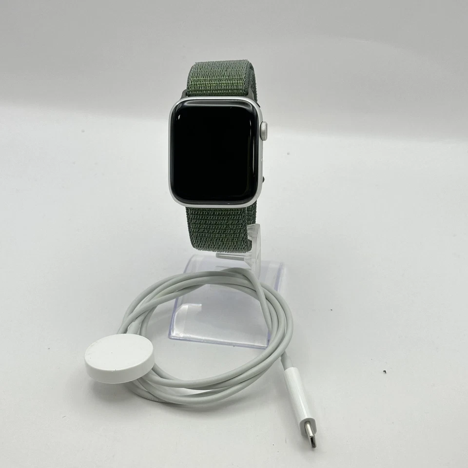 Apple Watch (SE) 2nd Gen. 44mm Silver Aluminum w/ Green Sport Loop (LTE) - 7/10 - Image 1 of 4
