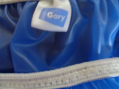 Pantalones de plástico para pañales para adultos Foto 1 de 3