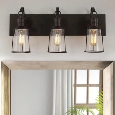 Luz de tocador rústica de bronce frotado con aceite, 22 pulgadas Aplique de pared de baño con jaula de 3 luces Foto 1 de 3