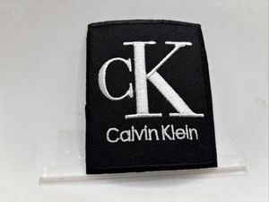 Calvin Klein NEW EMBROIDERED  IRON ON NAME PATCH TAG 3 X 2-1/2 - Picture 1 of 1