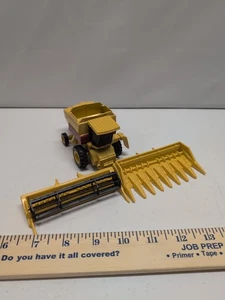 Ertl New Holland TR Series Combine 1/64 With Maroon Stripe w/ Corn & Grain Heads - Picture 1 of 7