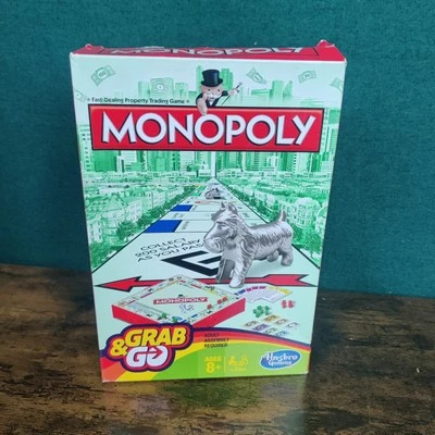 Hasbro B1002  Monopoly Grab & Go Game Box Opened But Never Used Still Sealed  - Image 1 of 4