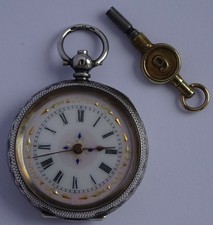 Swiss made antique solid silver fob pocket watch with fancy gilt dial. Working