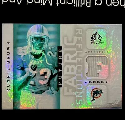 2005 Reflections Future Fabrics #FFRRB Ronnie Brown Jersey Miami Dolphins RC - Image 1 of 2
