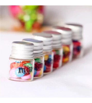Tarros de caramelo de vidrio en miniatura y pequeñas golosinas de frijoles M embotellados hágalo usted mismo dulces artesanales Foto 1 de 4