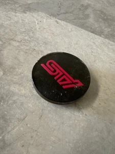Subaru WRX STI Center Cap Used Single Graphite OEM - Picture 1 of 3