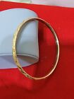 10k gold textured  opening Bangle 2.5 Inch Diameter closed over 3" open