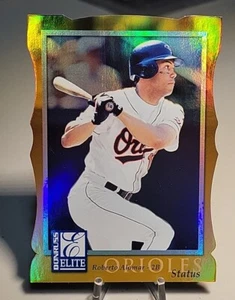 1998 DONRUSS ELITE GOLD STATUS PRESSOFUSO #34 ROBERTO ALOMAR ORIOLI NUMERATI/100 - Foto 1 di 3
