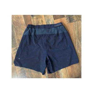 Pantalón Corto Lululemon Surge Forrado 6" Grande Grava Polvo Verdadero Azul Marino Talla Mediana - Imagen 1 de 4