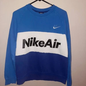 Sudadera Nike Para Hombre Empalme de Aire Bloque de Color Grande Logo Polar Cuello Redondo - Imagen 1 de 4