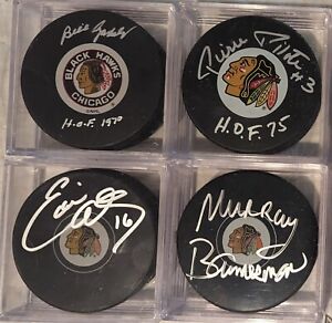 Lot Of 4 Blackhawks Autographed Hockey Pucks (Gadsby, Polite, Olczyk & Bannerman