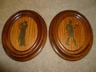 A PAIR OF OVAL SHAPED FRAME, GREEK GOD SILHOUETTES. GREEK SOLDIER SILHOUETTES