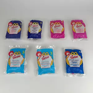 Lotto 7 giocattoli Happy Meal Barbie McDonald's McDonald's vintage anni 90 nuovi/sigillati - Foto 1 di 15