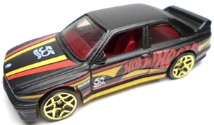 2022 HOT WHEELS BMW M3 HW 55TH BLACK 1:64 DIECAST 2 3/4" CAR W RED YELLOW & GOLD - Picture 1 of 6