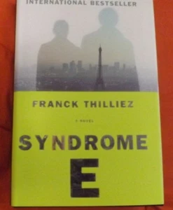 Syndrome E: International Bestseller Franck Thilliez Brand New HC Fast Ship - Foto 1 di 1