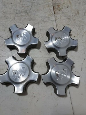 Juego de cuatro tapacubos centrales de rueda Buick Rendezvous 2002-2005 OEM C/N 9593778 Foto 1 de 4