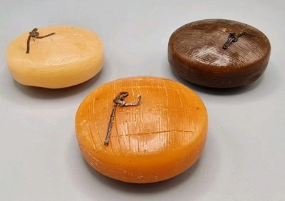 Pack of 18 Floating Candles, 8cm Diameter, Sandalwood Scent - Image 1 of 3