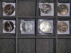 mixed canadian silver dollars.