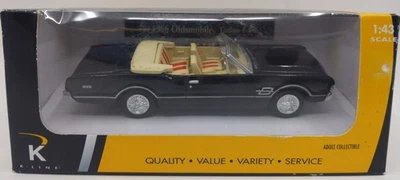 K-Line K94103-101DC 1:43 Black w/ Red Striped Seats 1966 Oldsmobile 4-4-2 Car - Image 1 of 2