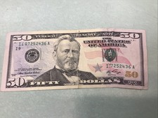 One of a Kind 2006 $50 Bill Error Bill Crease and Tear After Getting Caught!