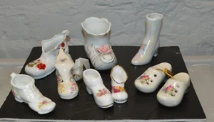ORNAMENTAL BOOTS WITH A FLORAL DESIGN SEVEN SINGLE BOOTS AND ONE PAIR OF CLOGS - Picture 1 of 11