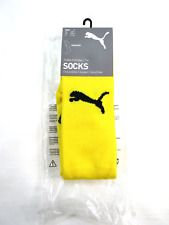 Puma knee-high football socks. Size one yellow black.