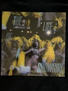 The Life of a Showgirl: Baby, That's Show Business Edition Blue Sparkle Vinyl - Picture 1 of 3