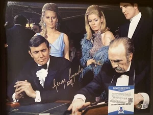 GEORGE LAZENBY SIGNED JAMES BOND 007 MAJESTY 11x14 MOVIE PHOTO BECKETT COA BAS 5 - Bild 1 von 1