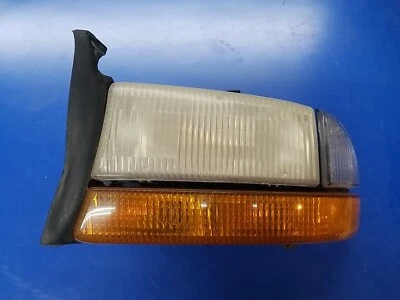 Conjunto de lámpara de faro izquierdo para conductor Dodge Dakota LH 1997-2004 OEM USADO Foto 1 de 4