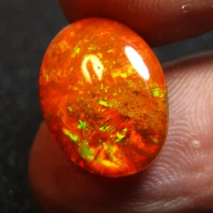 5.60Cts Natural Color Play Orange Opal 16.3x12.5mm Oval Gemstone from Ethiopia - Picture 1 of 6