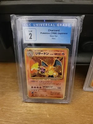 Base Set Charizard Holo (Japanese) CGC 2!  - Image 1 of 2