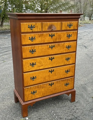Eldred Wheeler tall chest of 6 drawers. Tiger maple and cherry with shell carved Cover