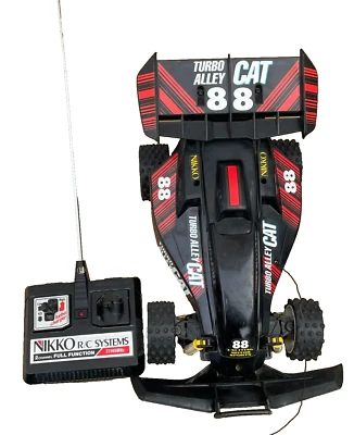 Vintage 80s Nikko Black Turbo Alley CAT 88 RC Car, for Parts or Repair - Image 1 of 4