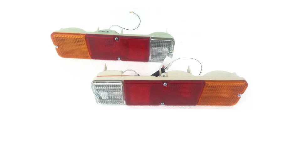 2 X FANALE POSTERIORE STOP SUZUKI SANTANA SAMURAI SJ413 SJ410 DX + SX - Imagen 1 de 1