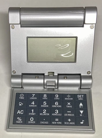 Vintage Brookstone Travel World Alarm Clock Flip Calculator Pocket Size New Cover