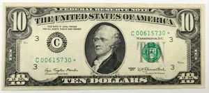 ** STAR ** UNC $10 1977 FEDERAL RESERVE NOTE ** PAPER CURRENCY AUCTIONS - Picture 1 of 4