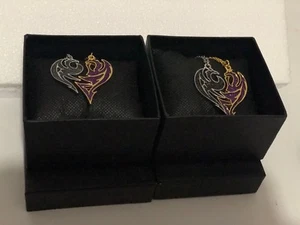 Due collane a forma di cuore drago alato di coppia tono oro e argento - Foto 1 di 11