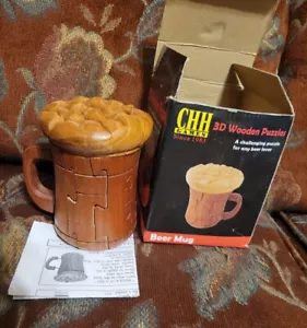 Neu im Karton 3D Holzpuzzle Spiel Bierbecher Holzpuzzle Stein Schaum Mann Höhle - Bild 1 von 4