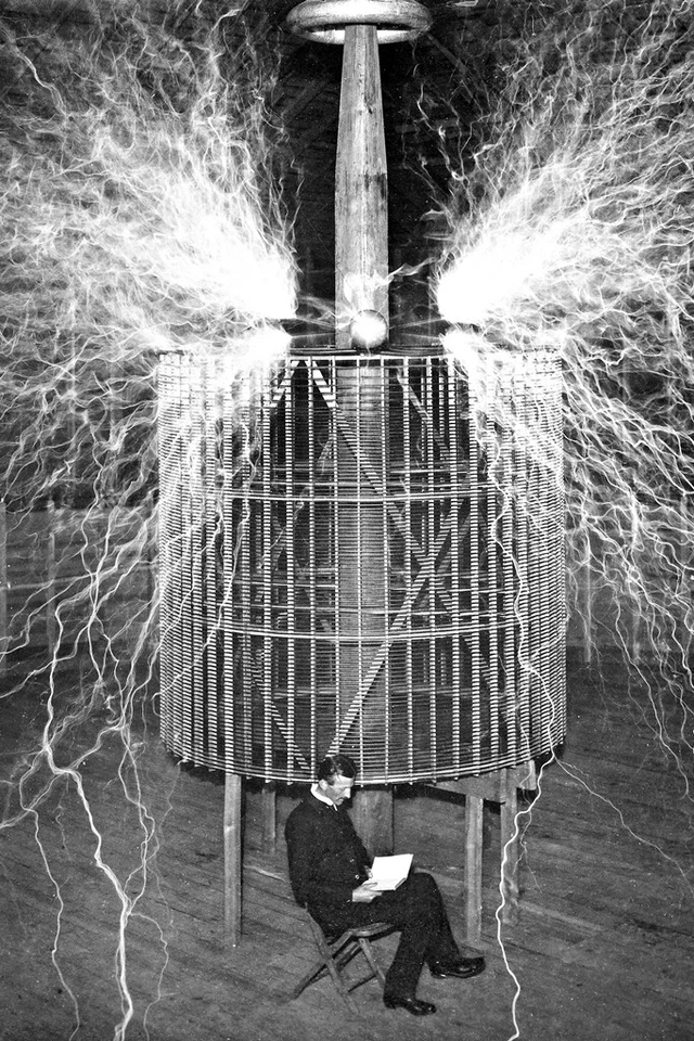 New 5x7 Photo: Nikola Tesla Reading in Laboratory, Electricity Double-Exposure - Image 1 of 1