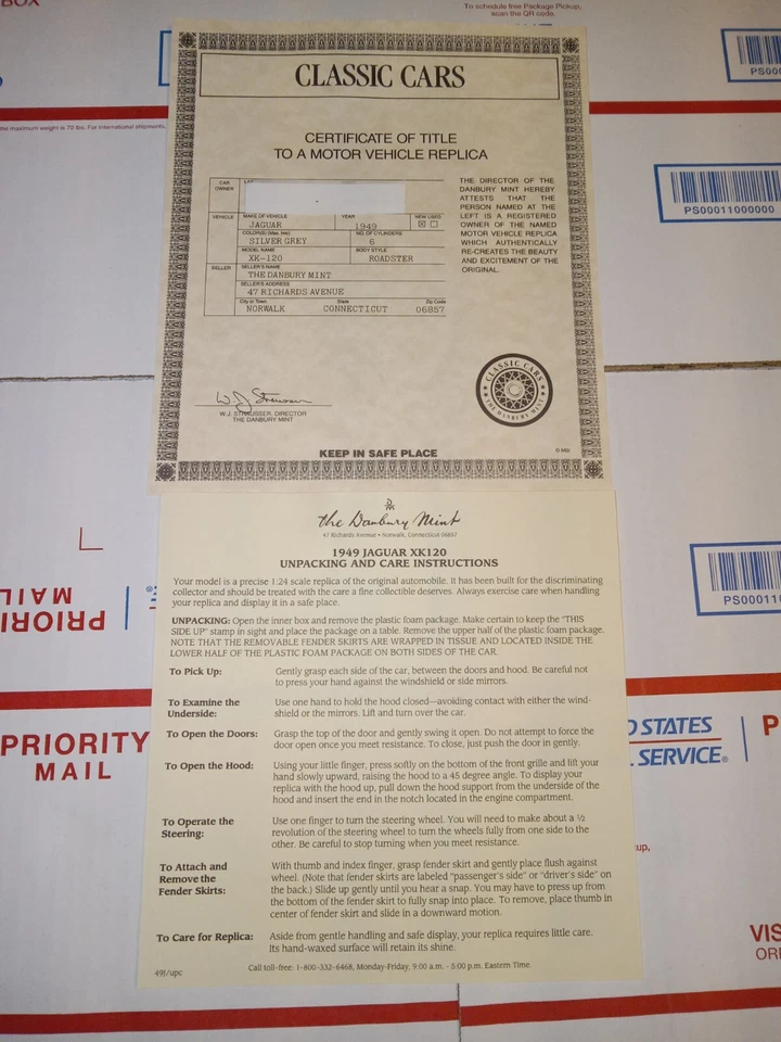 Jaguar XK-120 1949 gris plata Danbury Mint papeleo Foto 1 de 1