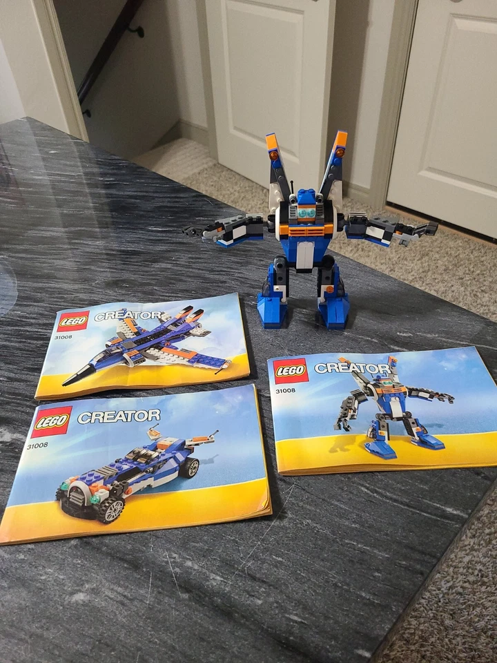100% complete LEGO 3in1 Creator 31008 Thunder Wings - Jet Plane / Robot / Car - Image 1 of 1