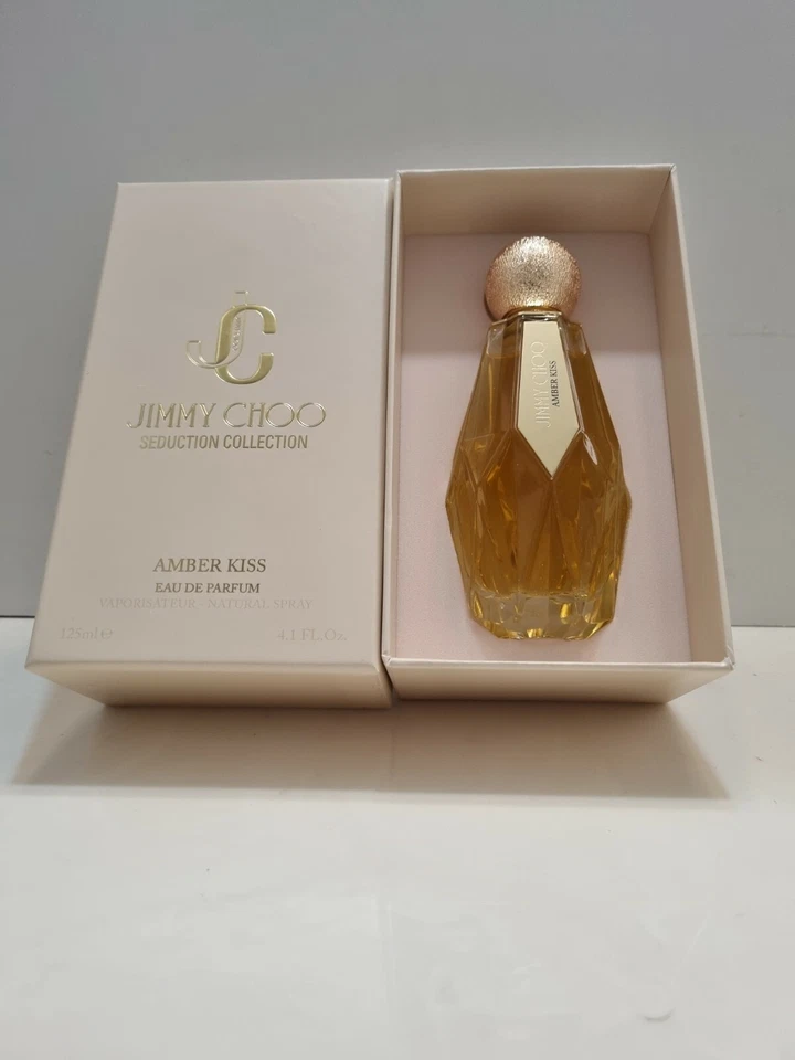 JIMMY CHOO AMBER KISS SEDUCTION COLLECTION EAU DE PARFUM 4.1 OZ / 125 ML DMG BOX - Image 1 of 1