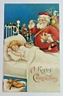 Carte postale vintage/antique Art International Père Noël, jouets et enfant endormi postée