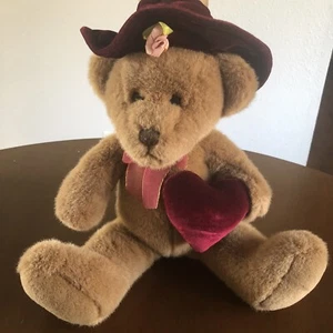Plush DAKIN Teddy Bear Wears Velour Hat And Holds Burgundy Red Heart - Picture 1 of 4