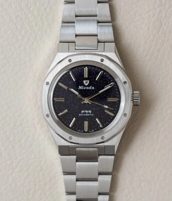 Nivada Grenchen F77 azul oscuro aventurina 68010A77 para hombre 37 mm acero automático Foto 1 de 4