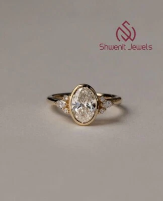 Anillo de compromiso de diamantes de laboratorio de corte ovalado de 1,60 quilates de oro amarillo de 10 quilates certificado VVS1/E IGI Foto 1 de 4