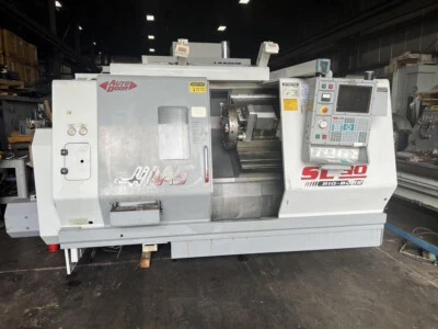 TORNO CNC HAAS, MODELO SL30TB, HERRAMIENTAS EN VIVO, DIÁMETRO DE HUSILLO DE 4", SERVOBAR, 2000 Foto 1 de 4