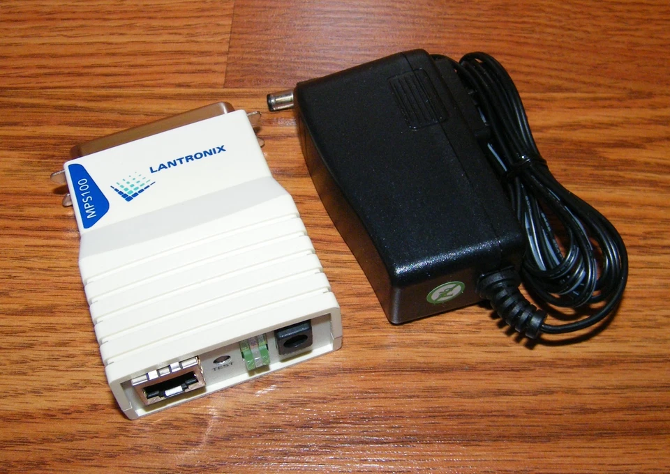 Choice of: Lantronix (MPS100) 10/100 Ethernet Micro Parallel Port Print Server  - Image 1 of 4
