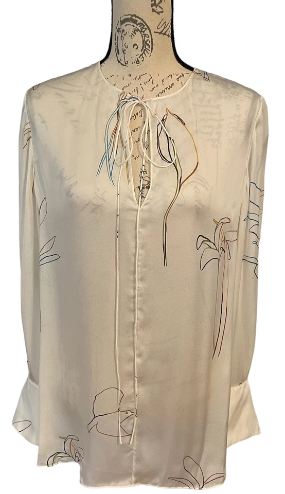 Blusa túnica fluida de seda Theory para mujer blanca con estampado floral manga larga pequeña Foto 1 de 4