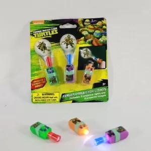 2 Pk Teenage Mutant Ninja Turtles “Finger Projector Lights” New Lot Of 2 - Picture 1 of 9